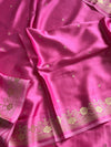 Rose pink Banarasi mashru silk saree with golden zari work and rich pallu.
