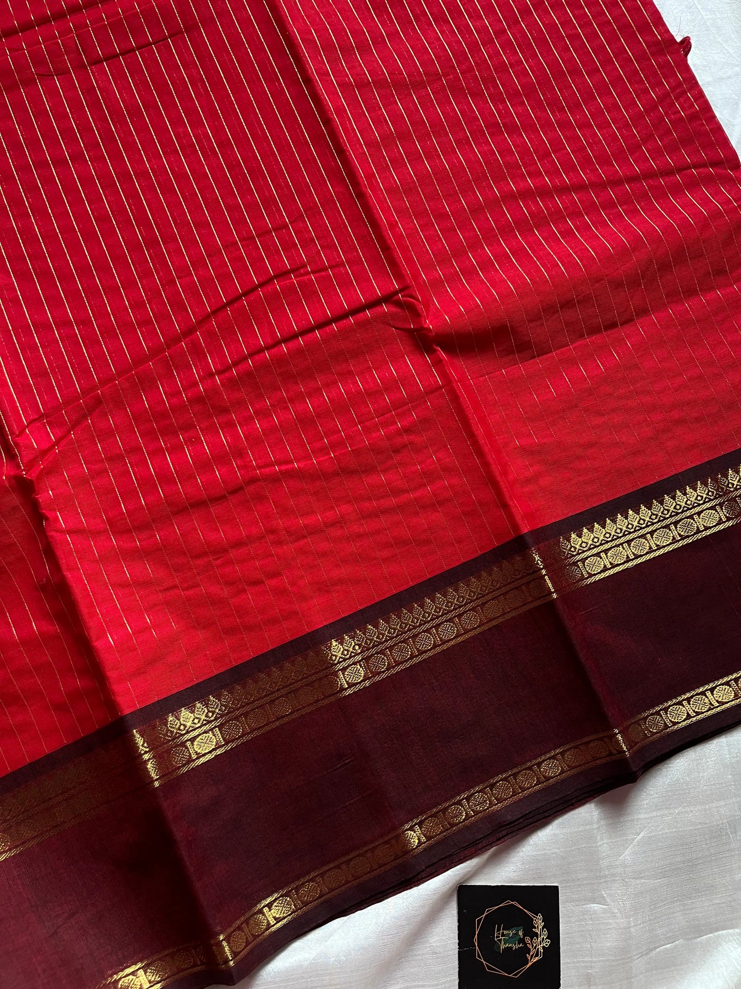 Festive red Kanchi cotton saree with zari stripes and dual Ganga Jamuna border in brown and green ā House of Thansha Zari Edition
