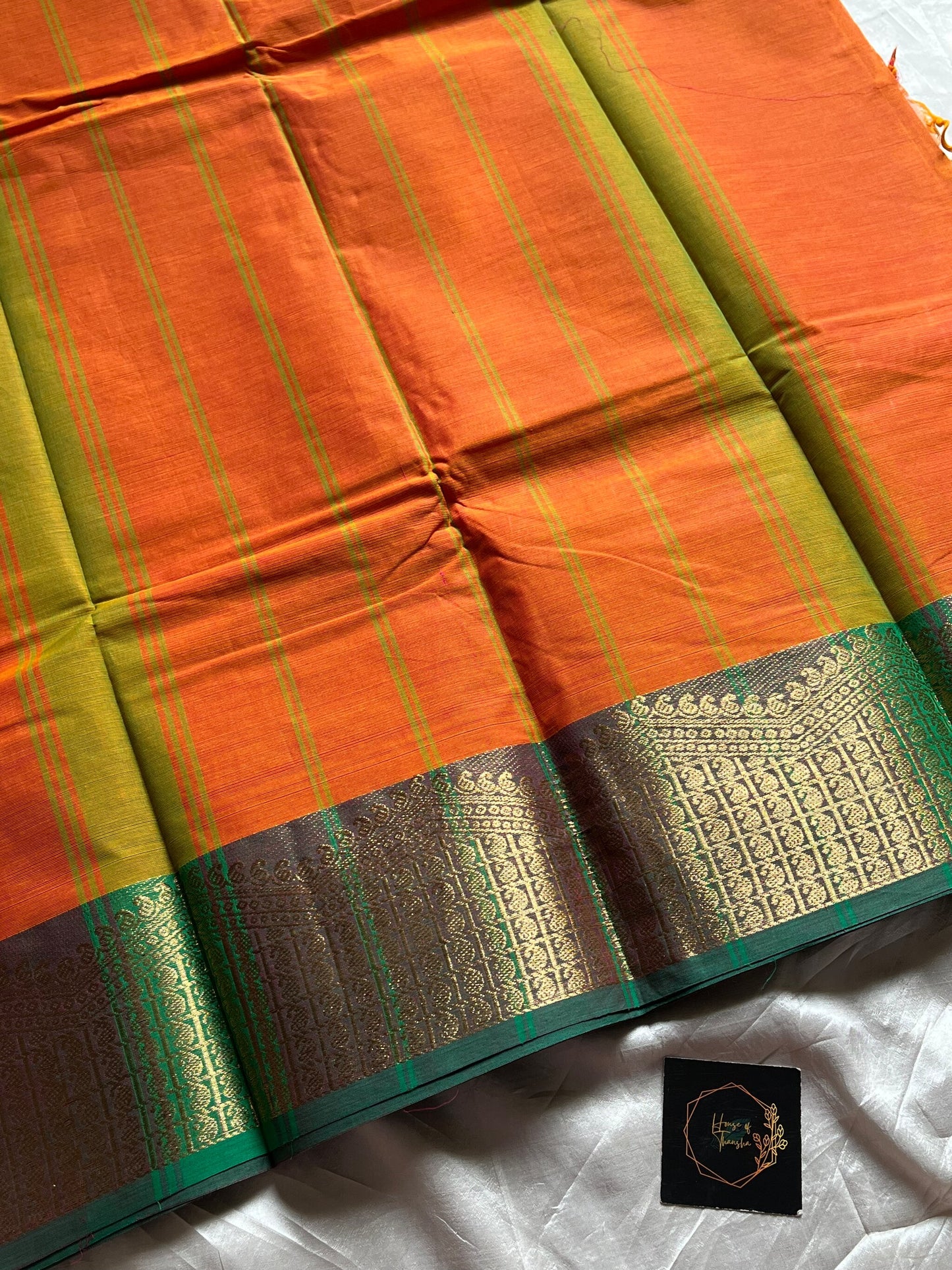 Orange Chettinadu cotton saree with subtle weave and green border, 6 meters