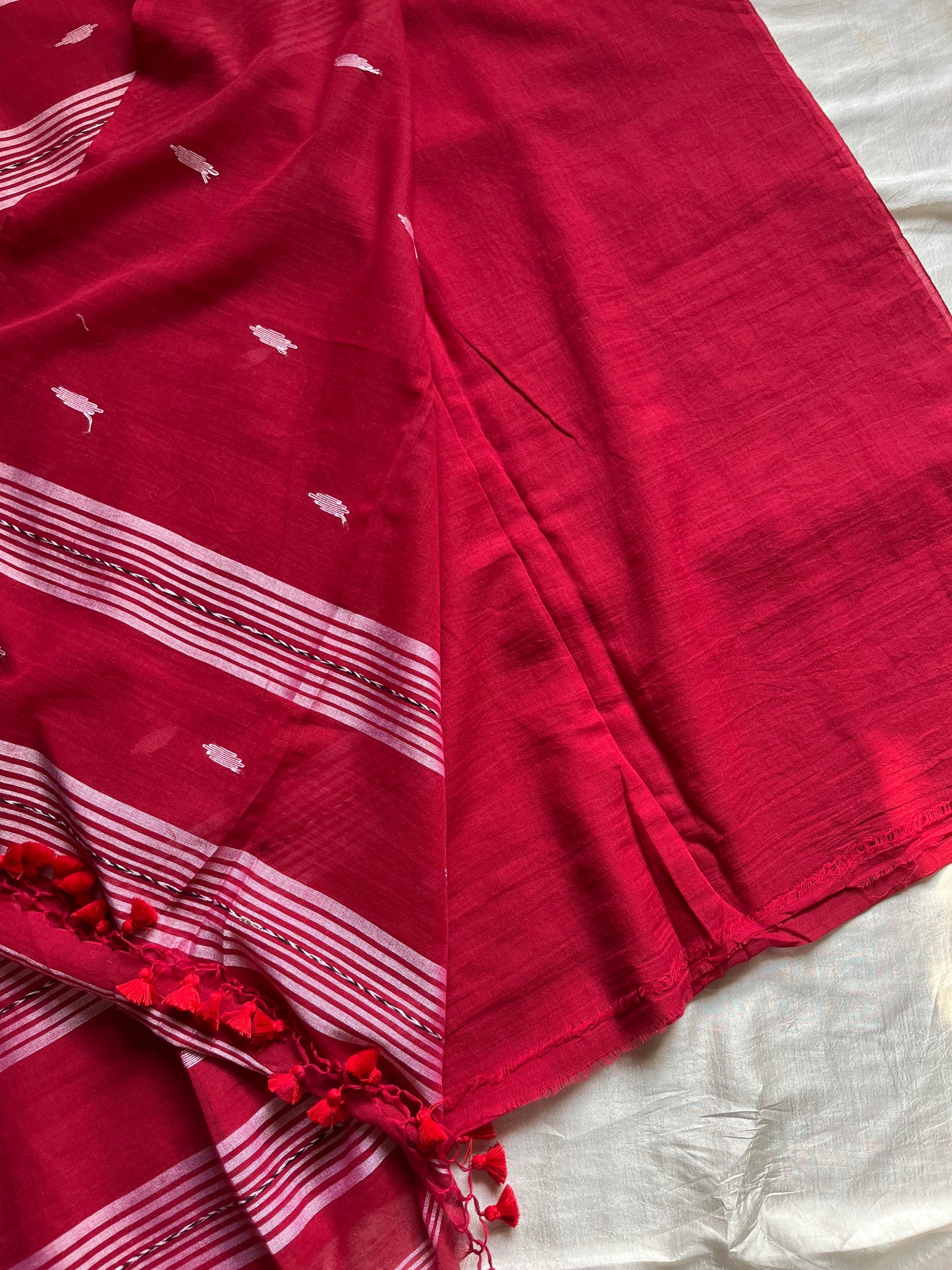 Ruhani – Pure handloom maroon mulmul cotton saree with subtle woven motifs | House of Thansha