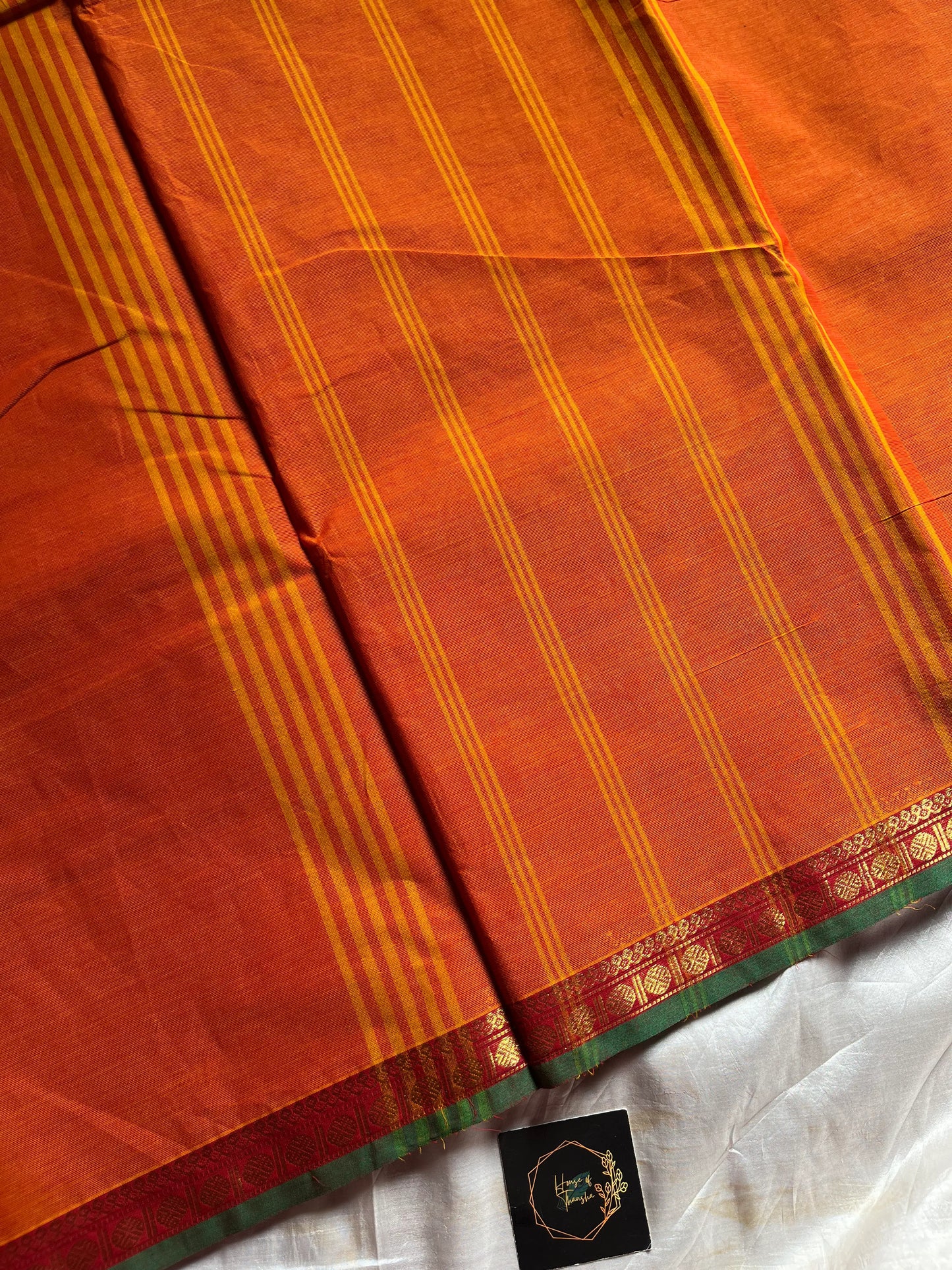 Subtle Weaves – Orange Kanchi Cotton Saree with Small Border