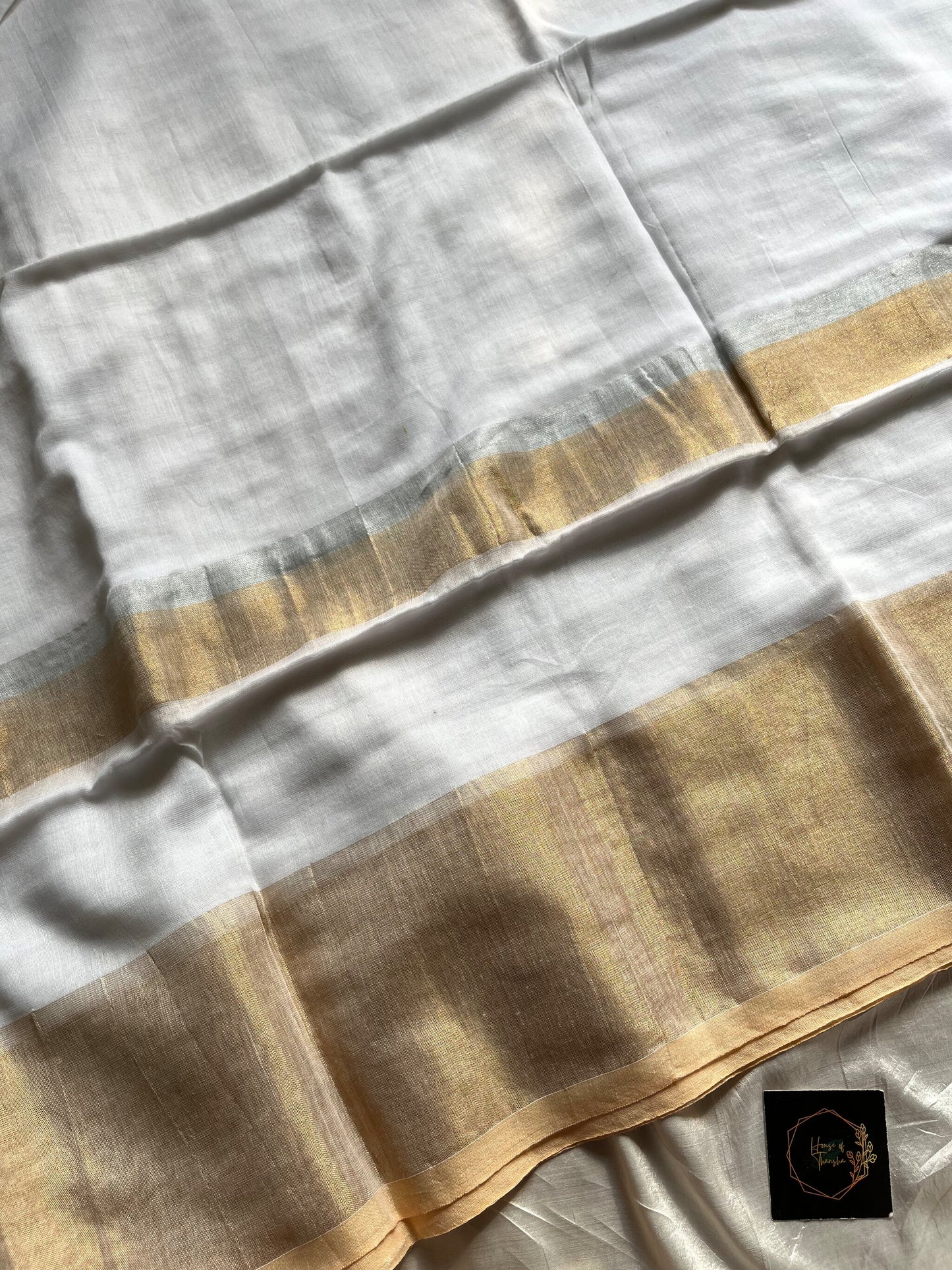 White Khadi Cotton Saree with matte golden border and running blouse, soft breathable fabric