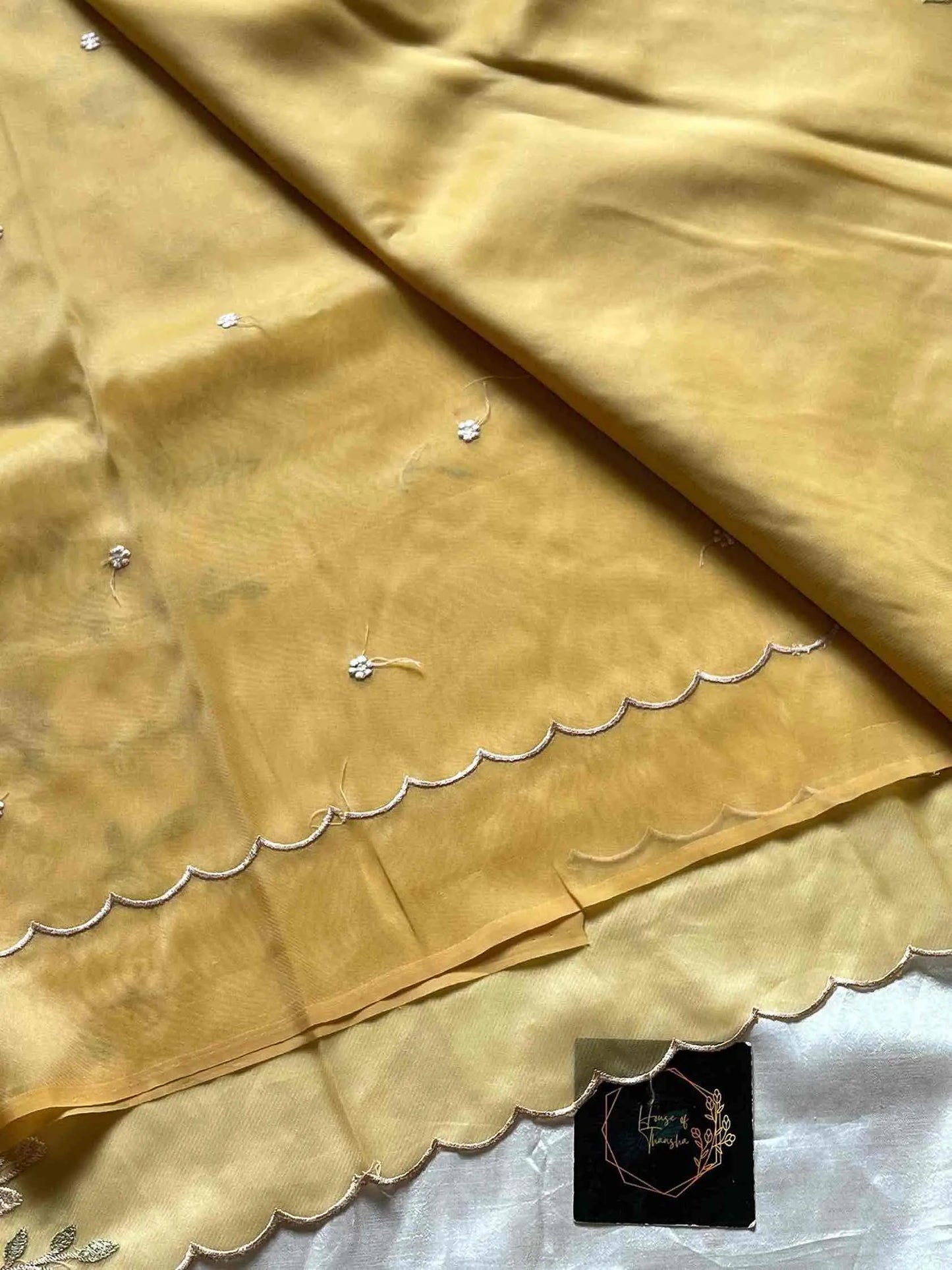 Soft organza saree with floral hand embroidery, flowy non-stiff drape by House of Thansha