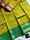 Green Chettinadu cotton saree with subtle weave and Ganga Jamuna border