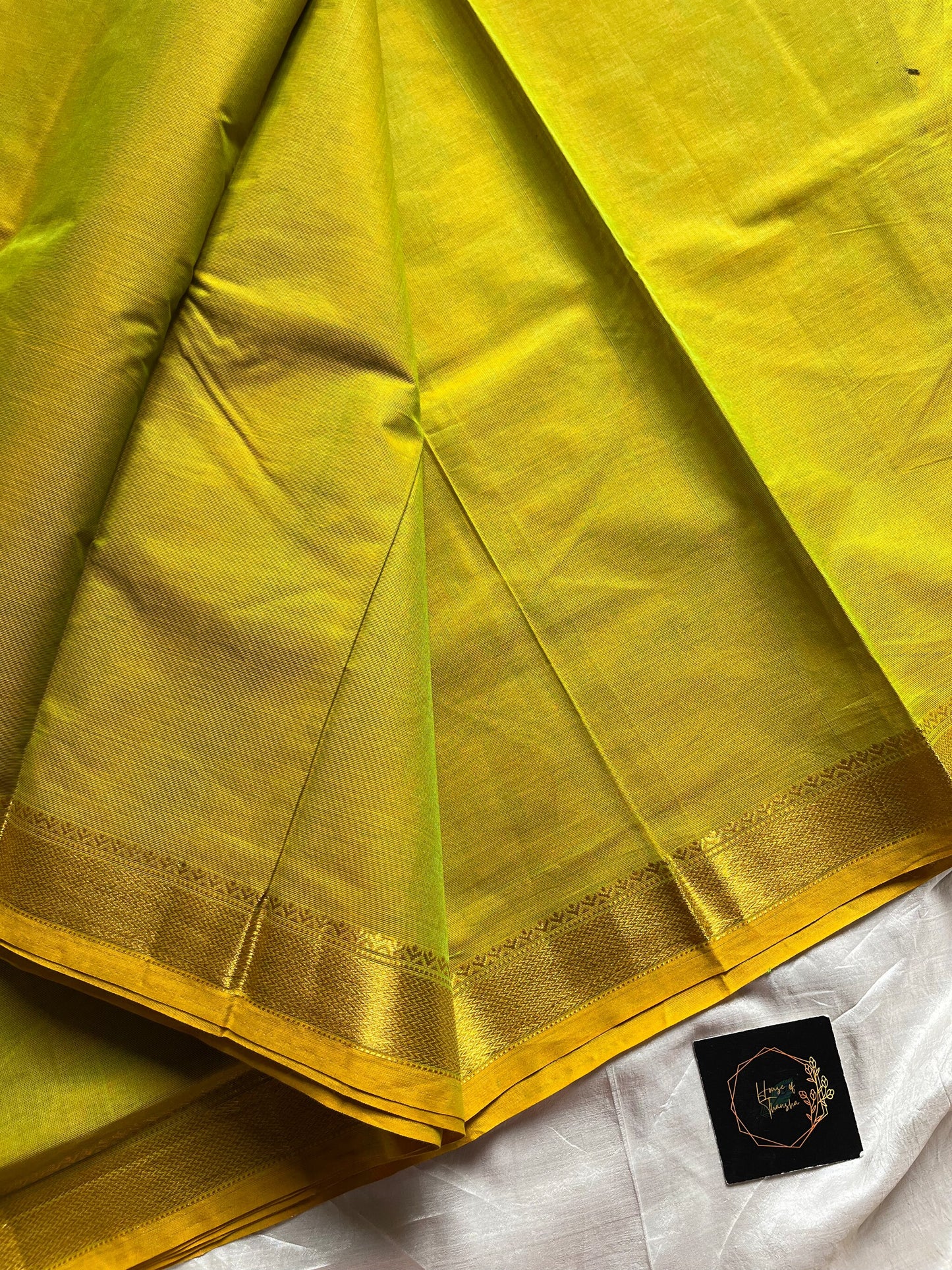 Yellowish green Chettinadu cotton saree with small golden zari border and zari motifs in body, 6 meters
