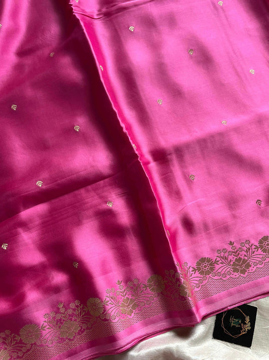 Rose pink Banarasi mashru silk saree with golden zari work and rich pallu.