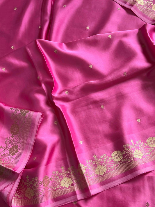 Rose pink Banarasi mashru silk saree with golden zari work and rich pallu.
