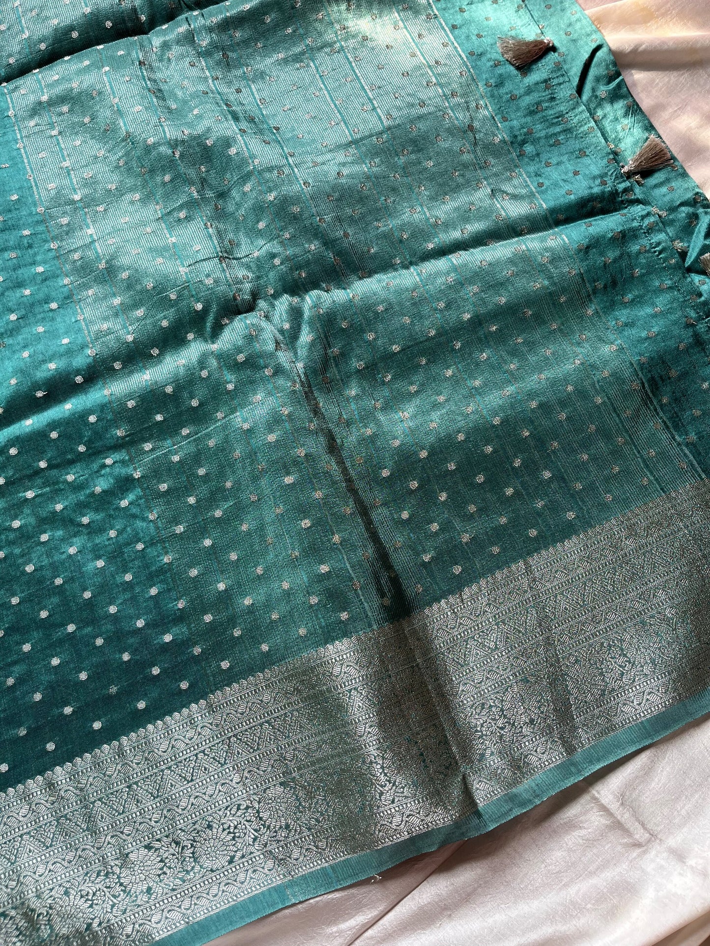 Blue Dola Silk Saree with silver butta, dense pallu, and purple contrast blouse
