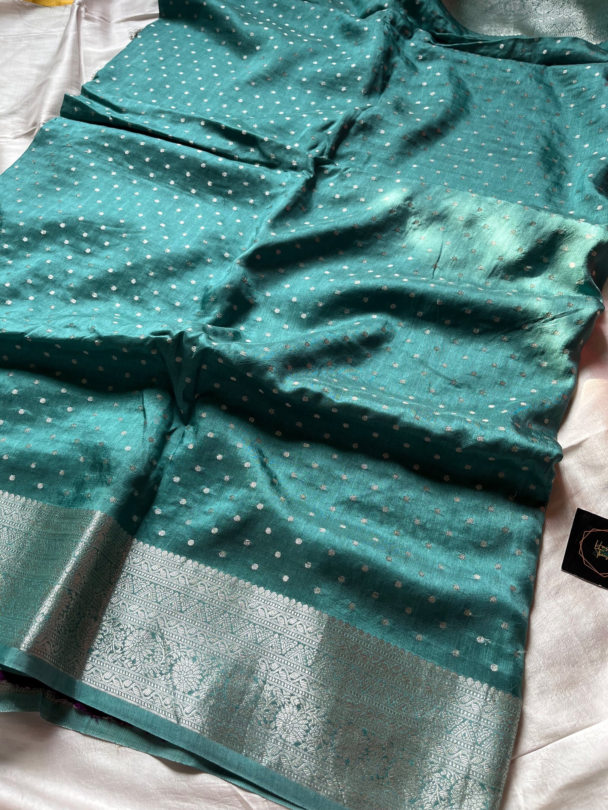 Blue Dola Silk Saree with silver butta, dense pallu, and purple contrast blouse
