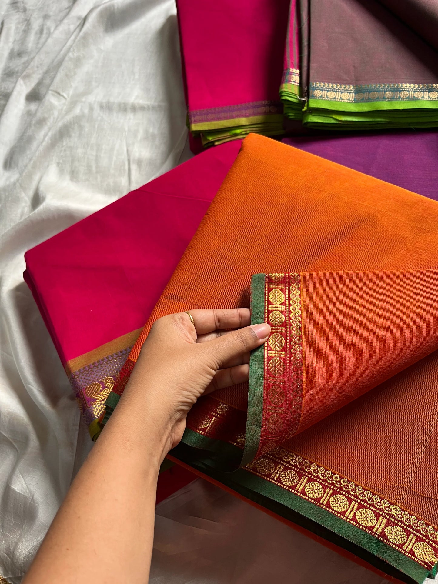Subtle Weaves – Orange Kanchi Cotton Saree with Small Border