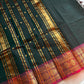 Dark green Kanchi cotton saree with maroon vintage border – handloom drape from House of Thansha.