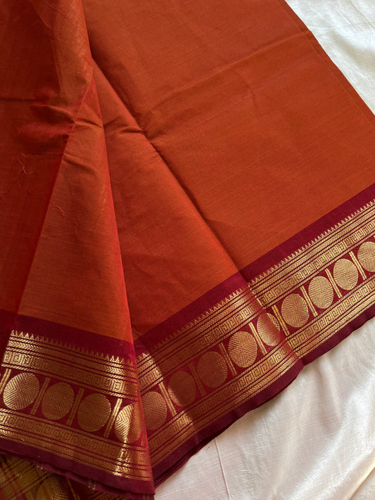 Rust orange Kanchi cotton saree with maroon vintage border – handloom drape from House of Thansha.
