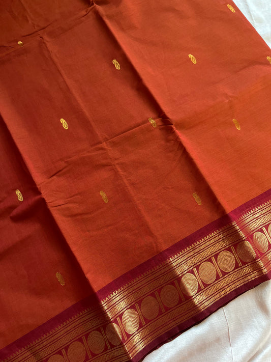 Rust orange Kanchi cotton saree with maroon vintage border – handloom drape from House of Thansha.