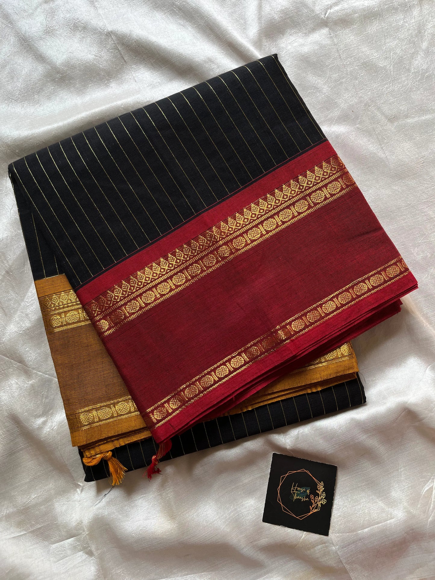 Zari Edition Black Kanchi Cotton Saree with golden zari stripes and dual Ganga Jamuna border in maroon and mustard yellow – House of Thansha