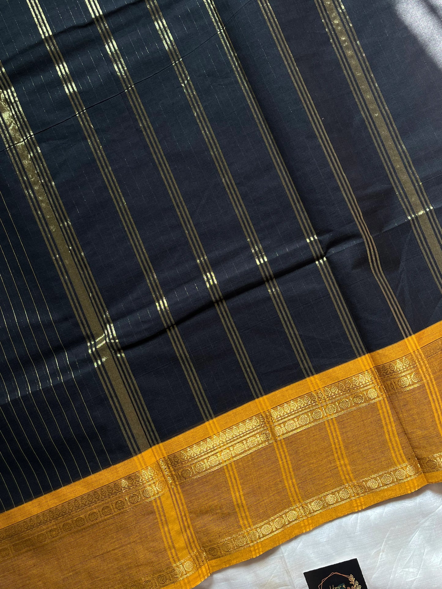 Zari Edition Black Kanchi Cotton Saree with golden zari stripes and dual Ganga Jamuna border in maroon and mustard yellow – House of Thansha