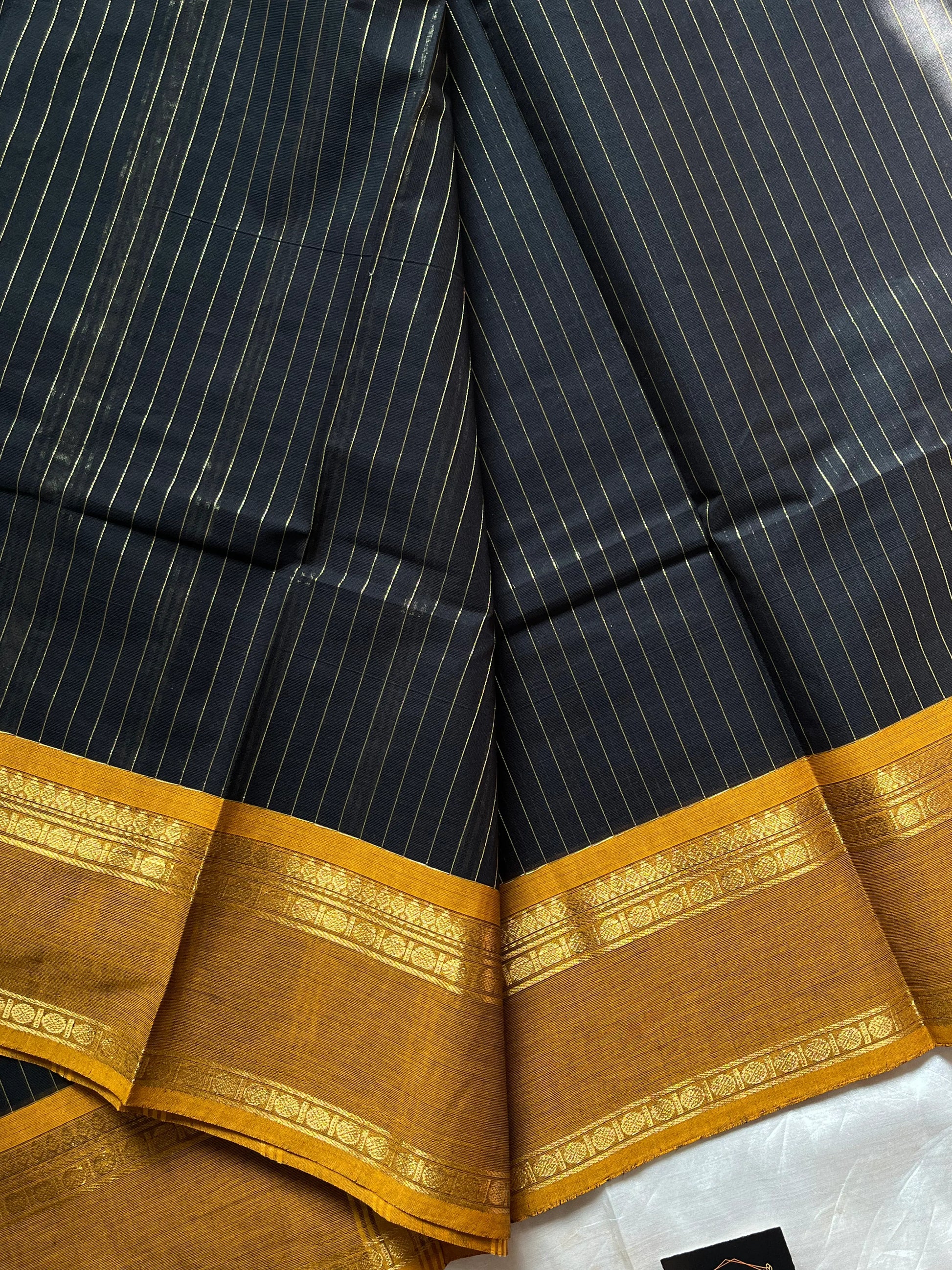 Zari Edition Black Kanchi Cotton Saree with golden zari stripes and dual Ganga Jamuna border in maroon and mustard yellow – House of Thansha