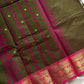 Earthy green Kanchi cotton saree with pink vintage border – handloom drape from House of Thansha.