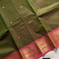 Earthy green Kanchi cotton saree with pink vintage border – handloom drape from House of Thansha.