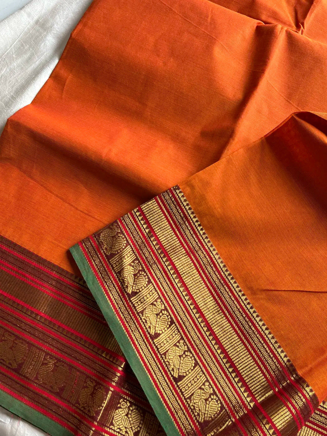 Subtle Weaves | Orange Kanchi Cotton Saree