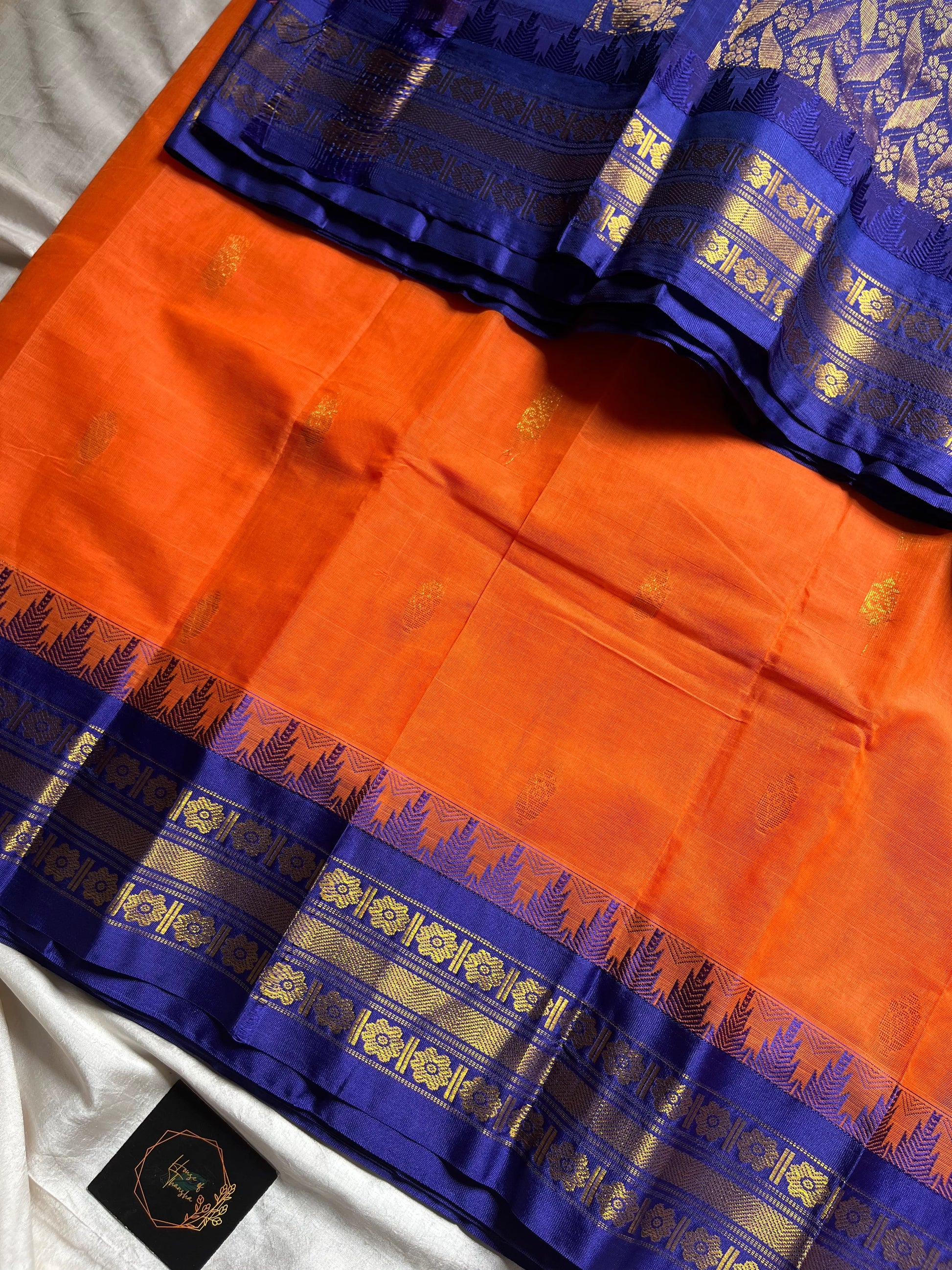 Orange Semi-Silk Cotton Saree with Golden Zari Motifs and Blue Grand Pallu – House of Thansha