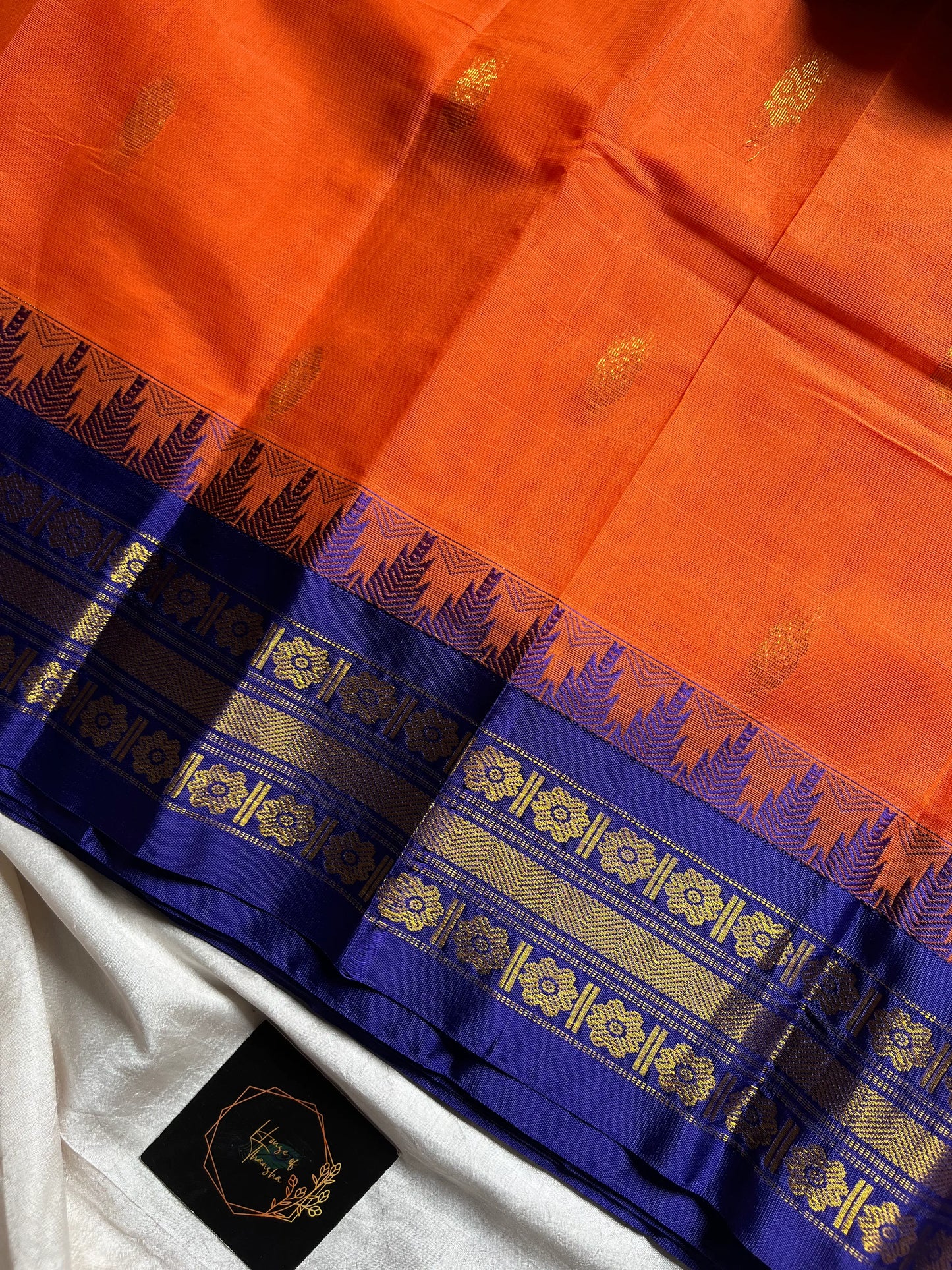 Orange Semi-Silk Cotton Saree with Golden Zari Motifs and Blue Grand Pallu – House of Thansha
