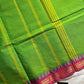 Subtle Weaves Green Kanchi Cotton Saree with small border and delicate woven detailing – House of Thansha