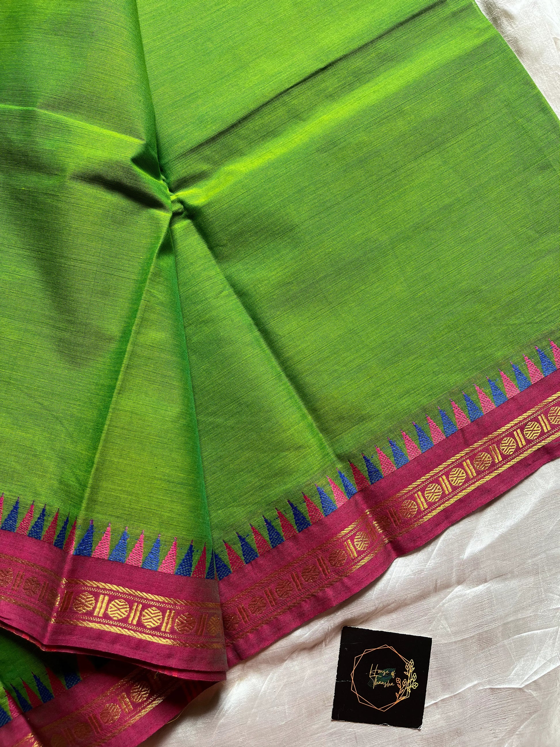 Subtle Weaves Green Kanchi Cotton Saree with small border and delicate woven detailing – House of Thansha
