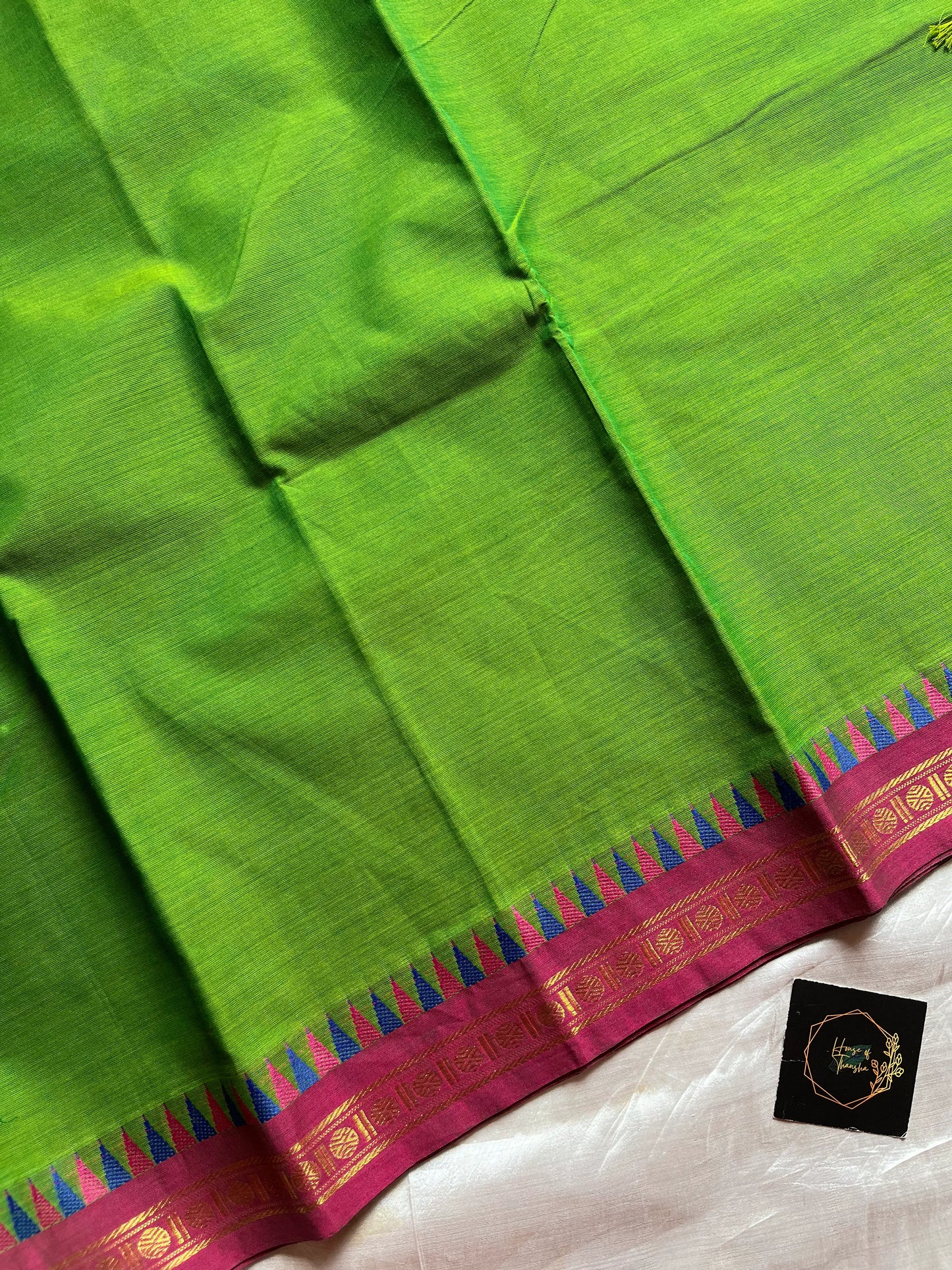 Subtle Weaves Green Kanchi Cotton Saree with small border and delicate woven detailing – House of Thansha