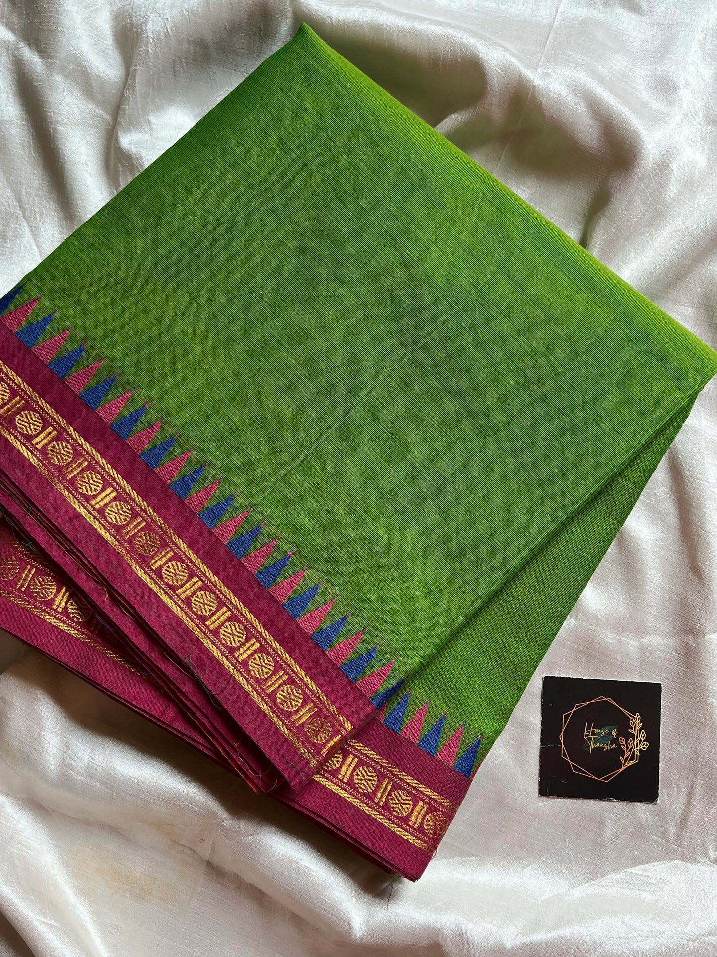 Subtle Weaves Green Kanchi Cotton Saree with small border and delicate woven detailing – House of Thansha