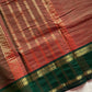 Raw Mango Green Kanchi cotton saree with golden zari stripes and dual green border, vintage handloom festive edition.