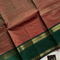 Raw Mango Green Kanchi cotton saree with golden zari stripes and dual green border, vintage handloom festive edition.