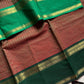 Raw Mango Green Kanchi cotton saree with golden zari stripes and dual green border, vintage handloom festive edition.