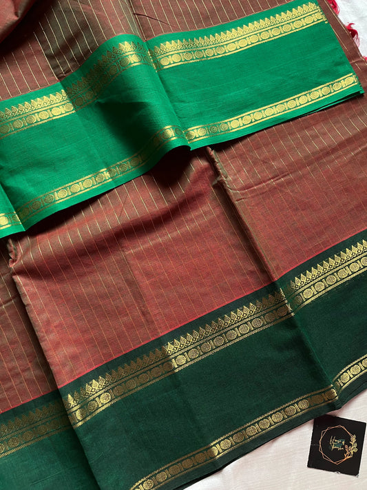Raw Mango Green Kanchi cotton saree with golden zari stripes and dual green border, vintage handloom festive edition.