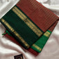 Raw Mango Green Kanchi cotton saree with golden zari stripes and dual green border, vintage handloom festive edition.