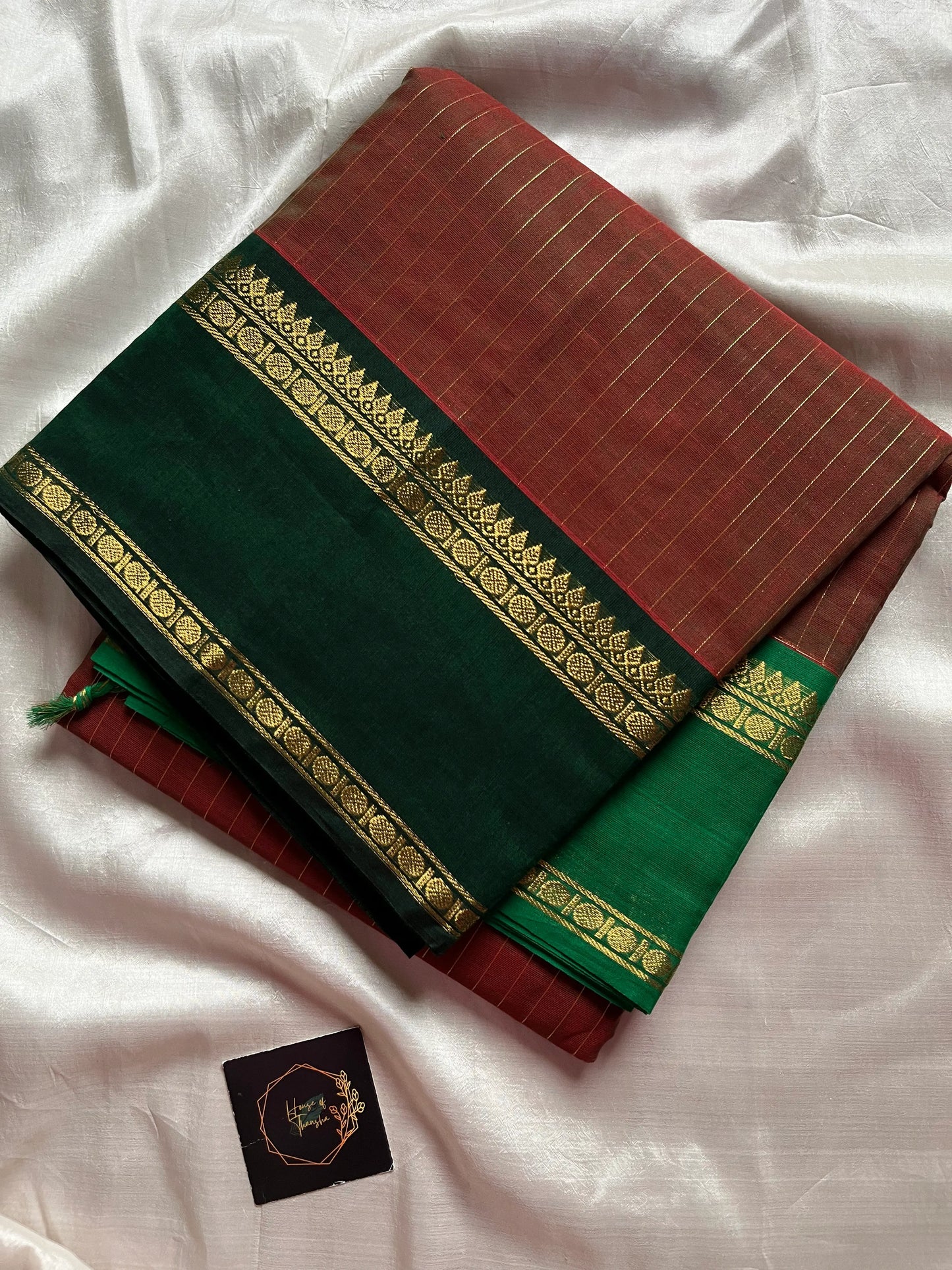Raw Mango Green Kanchi cotton saree with golden zari stripes and dual green border, vintage handloom festive edition.