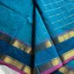 Blue pure Kanchi cotton saree featuring golden zari checks and a grand zari pallu.