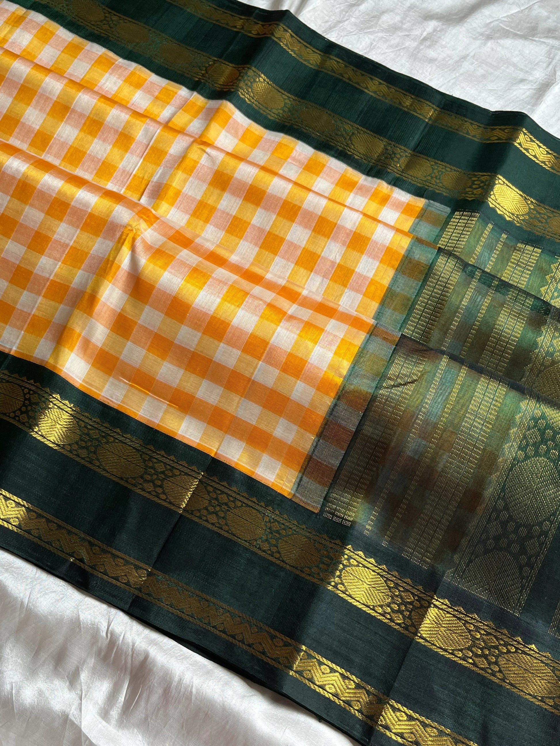 Yellow & white checked Kanchi silk cotton Paalum Pazhamum saree with dark green pure zari border and grand pallu – House of Thansha