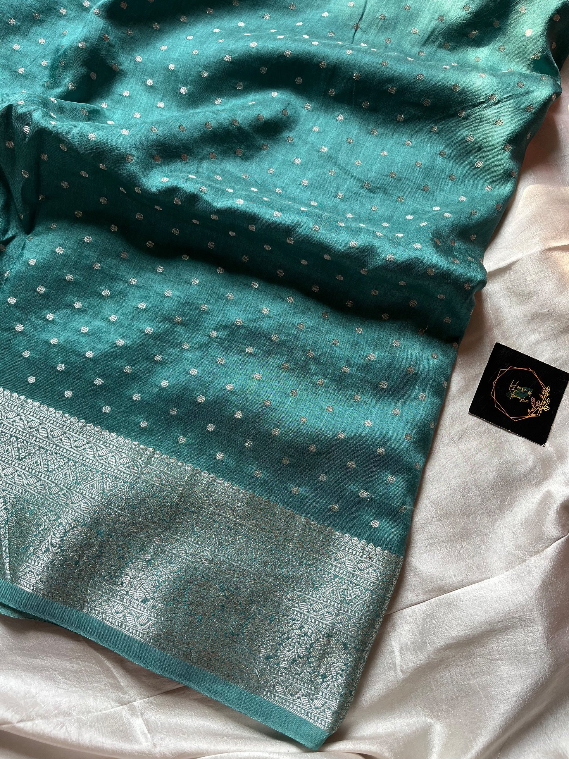 Blue Dola Silk Saree with silver butta, dense pallu, and purple contrast blouse
