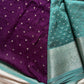 Blue Dola Silk Saree with silver butta, dense pallu, and purple contrast blouse
