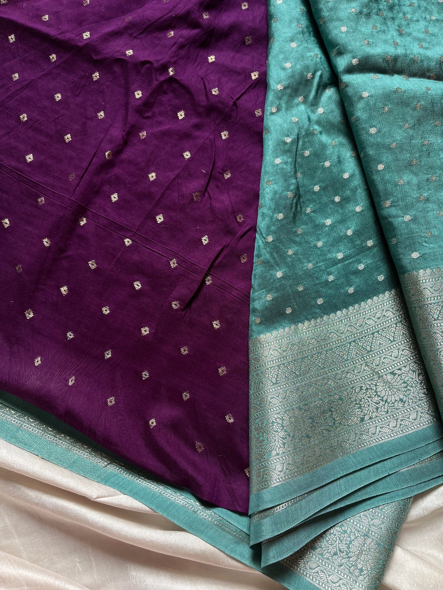Blue Dola Silk Saree with silver butta, dense pallu, and purple contrast blouse
