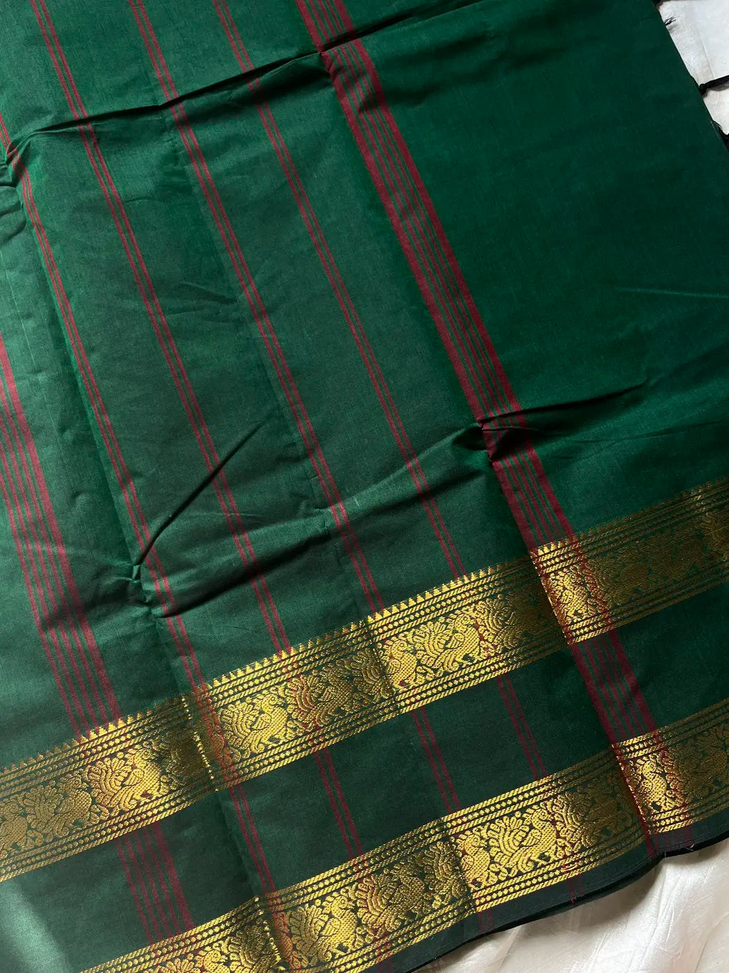 Subtle Weaves | Dark green Kanchi Cotton Saree
