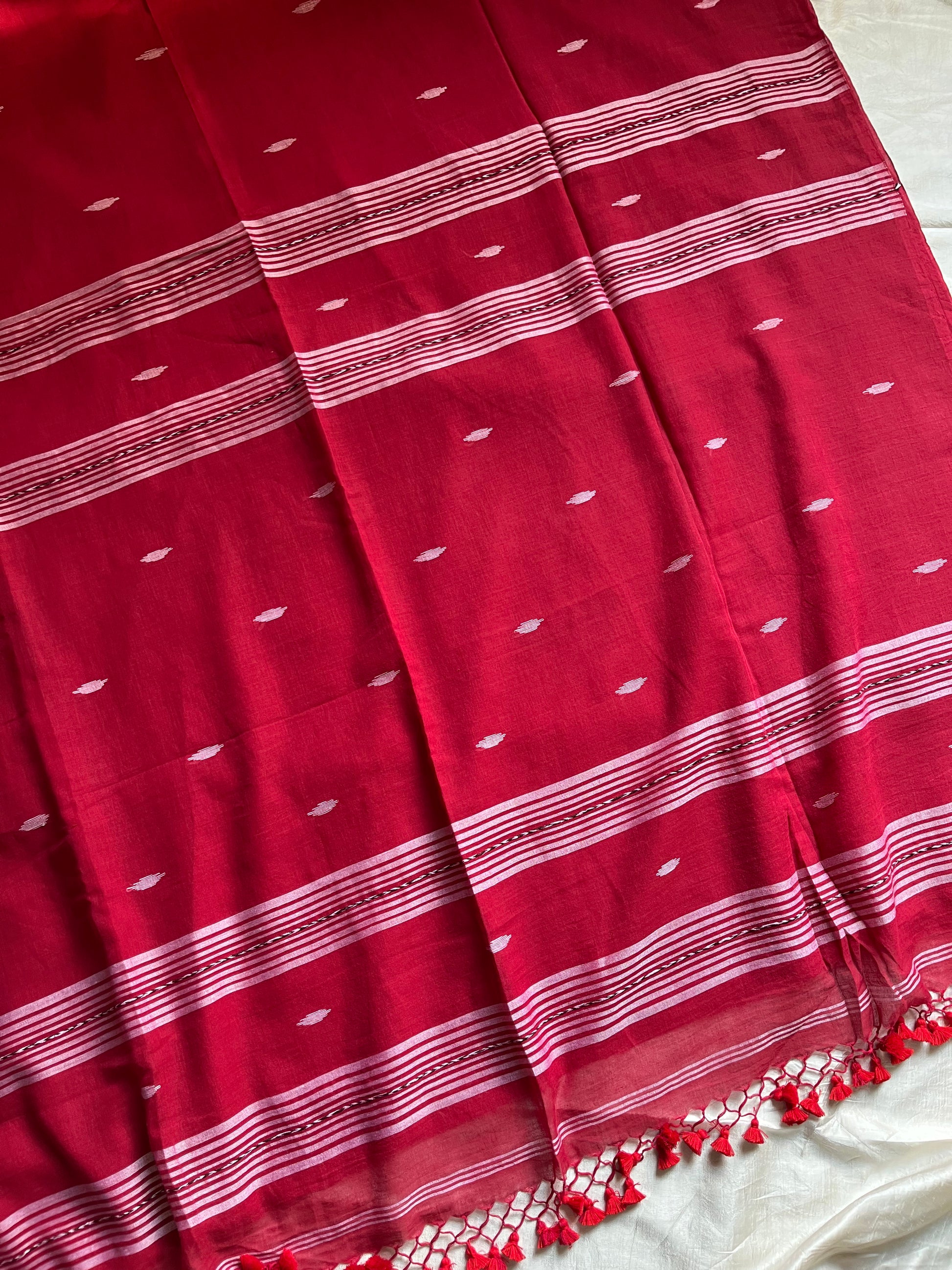 Ruhani – Pure handloom maroon mulmul cotton saree with subtle woven motifs | House of Thansha