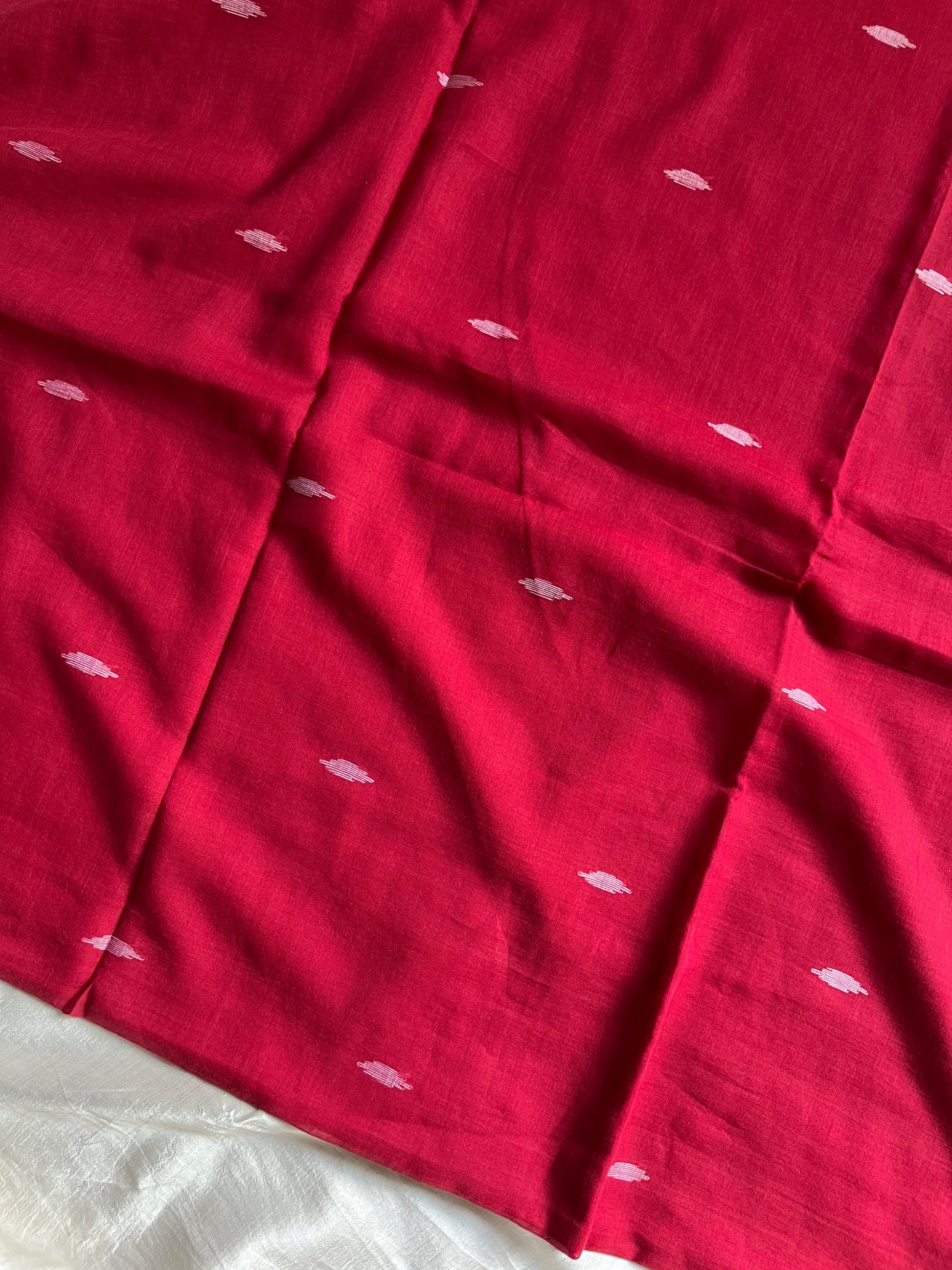 Ruhani – Pure handloom maroon mulmul cotton saree with subtle woven motifs | House of Thansha