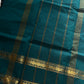 Subtle Weaves | Peacock Green Kanchi Cotton Saree