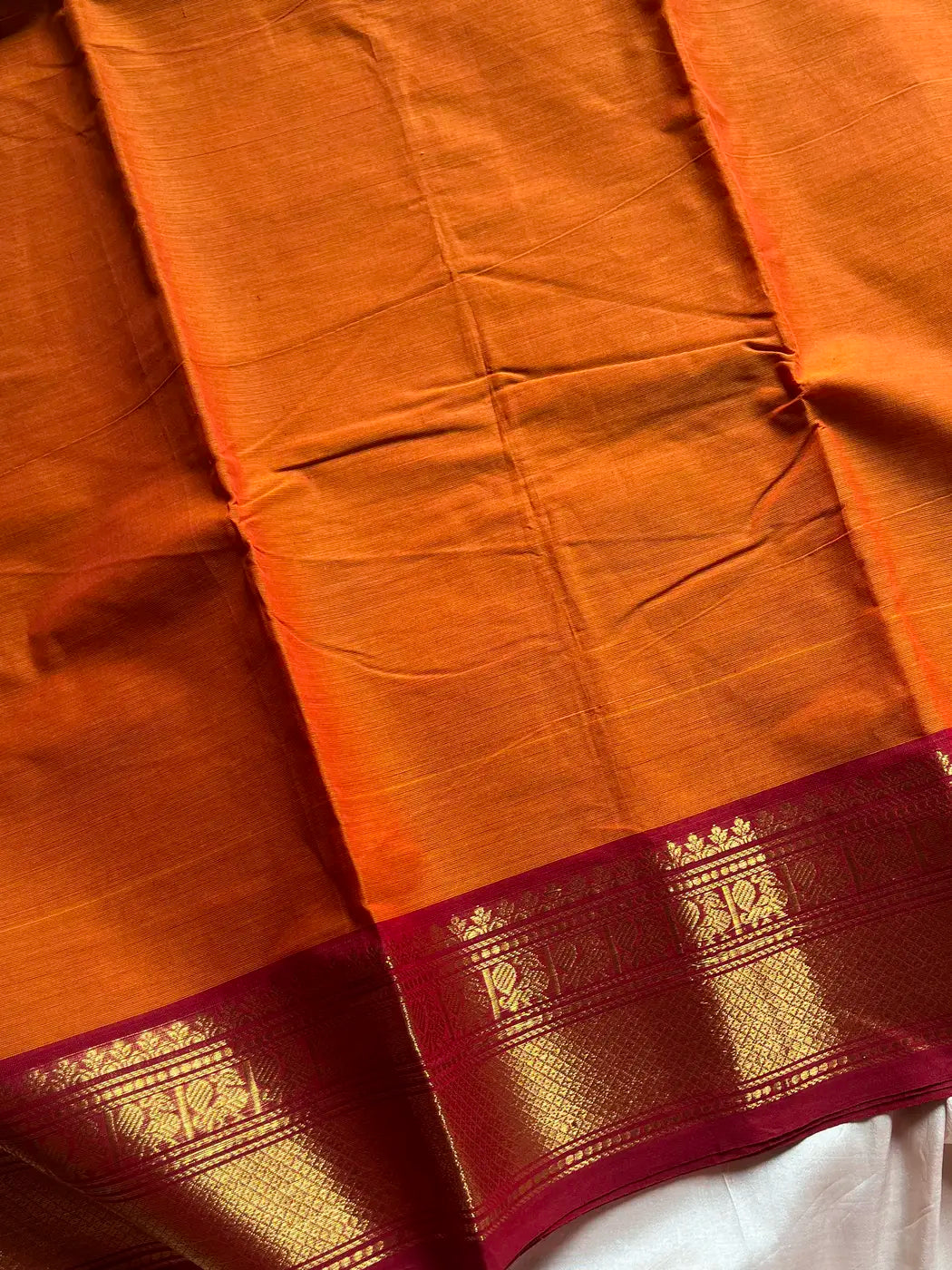 Subtle Weaves | Orange Kanchi Cotton Saree