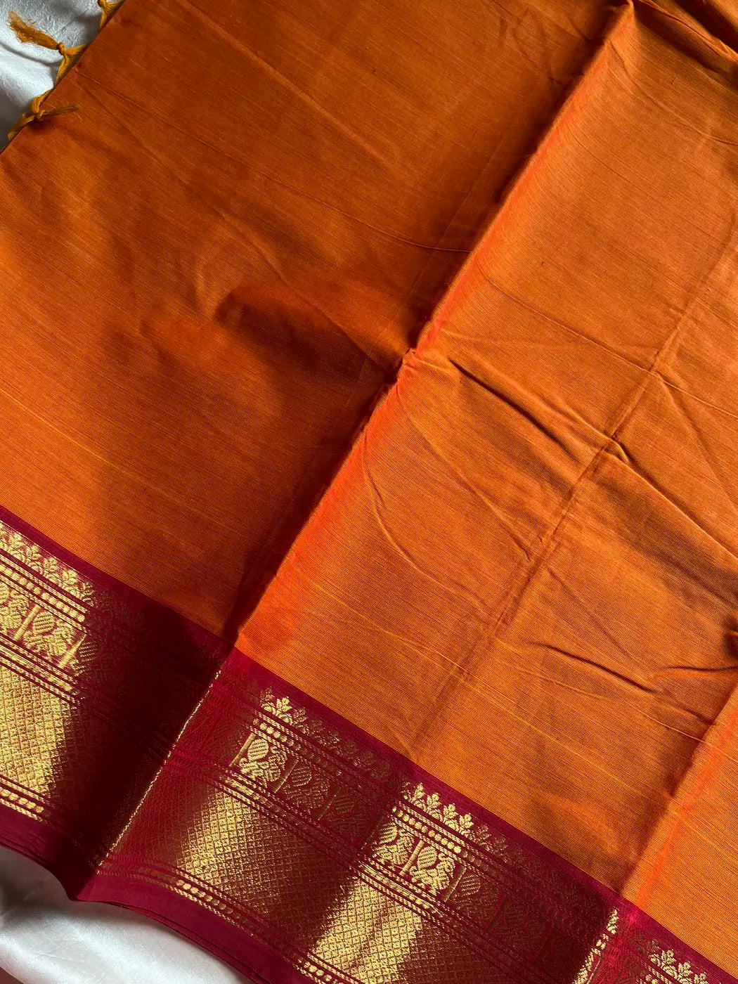 Subtle Weaves | Orange Kanchi Cotton Saree