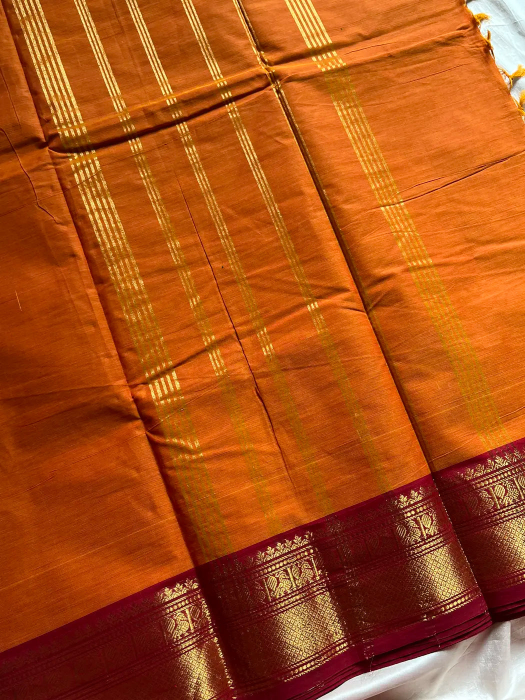 Subtle Weaves | Orange Kanchi Cotton Saree