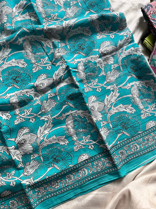 Sky blue handblock printed mulmul cotton saree with white floral motifs and contrast blouse – House of Thansha