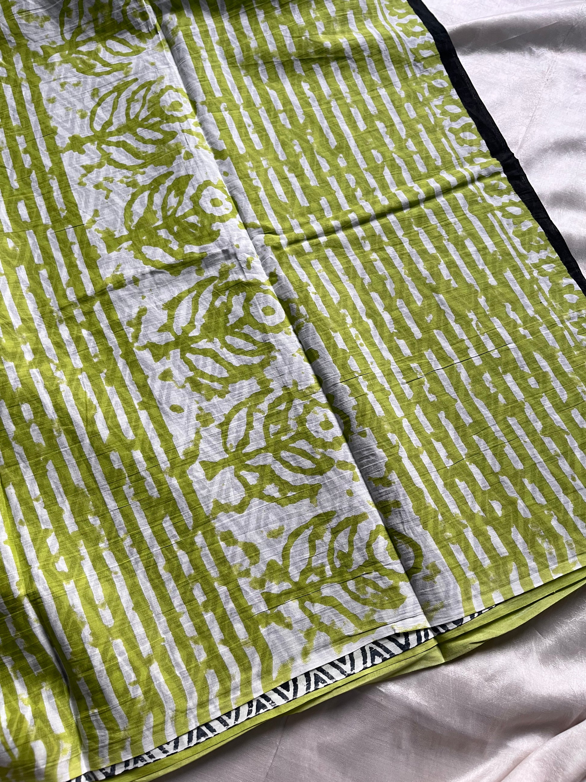 Black mulmul cotton saree with leaf green handblock border and contrast blouse – House of Thansha