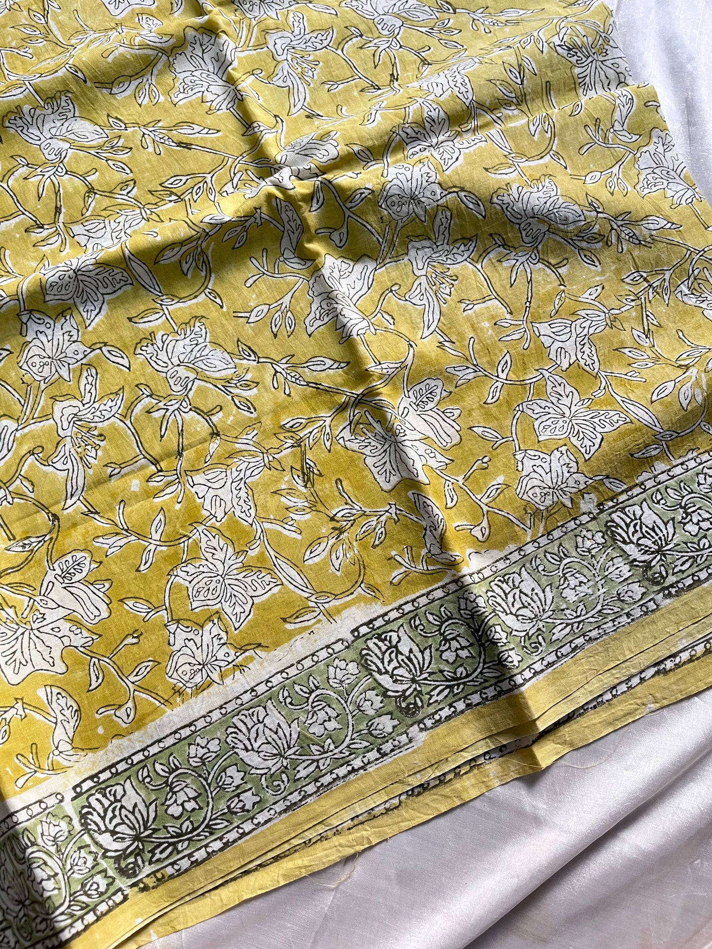 Aura – Yellow Block Printed Mulmul Cotton Saree with Green Border | House of Thansha